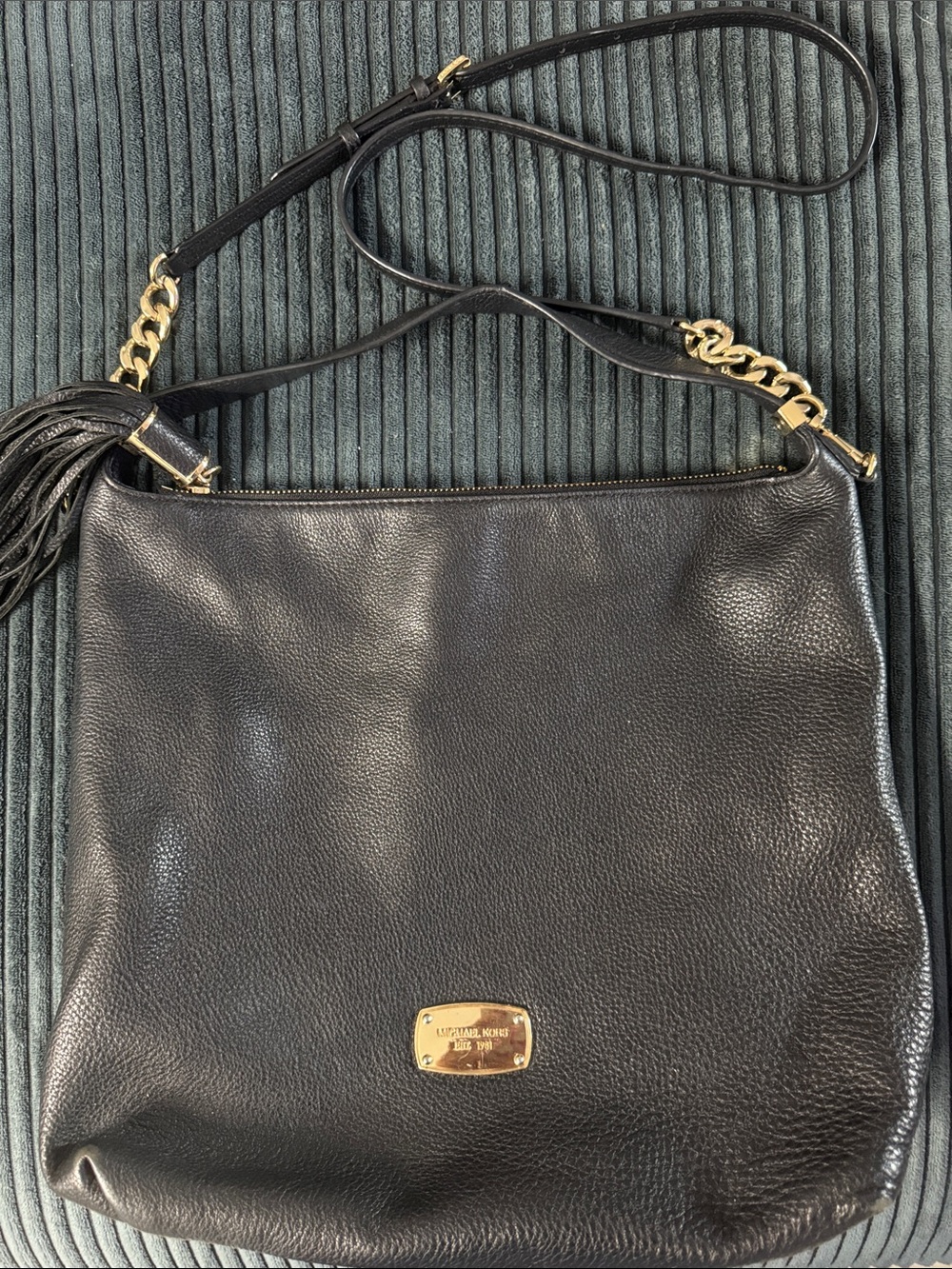 Michael Kors Black Leather Shoulder Bag with Gold Hardware and Tassel